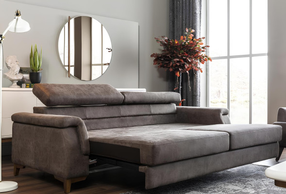 Canapea gri cu trei locuri și funcție de pat