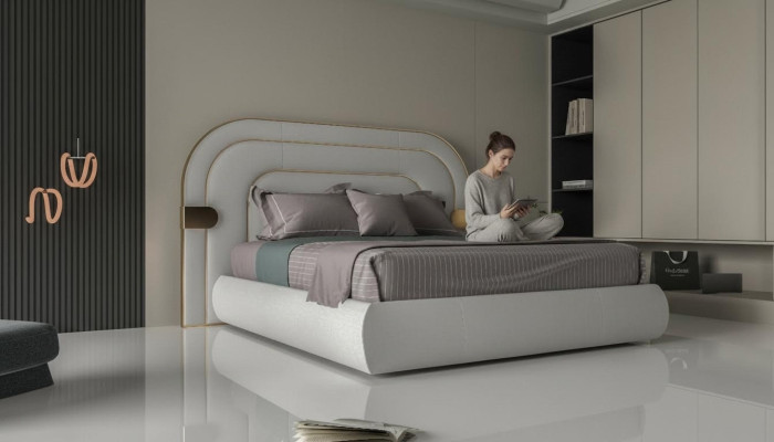 Cadru de pat gri luxos cu detalii aurii în design modern și capitonaj moale