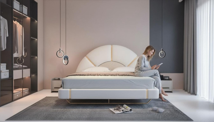 Pat modern de lux cu detalii aurii, cap de pat rotunjit