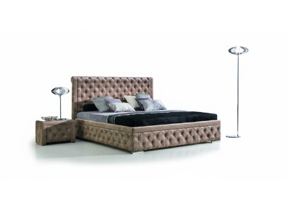 Ein luxuriöses Chesterfield-Bett in einem eleganten zeitgenössischen Stil